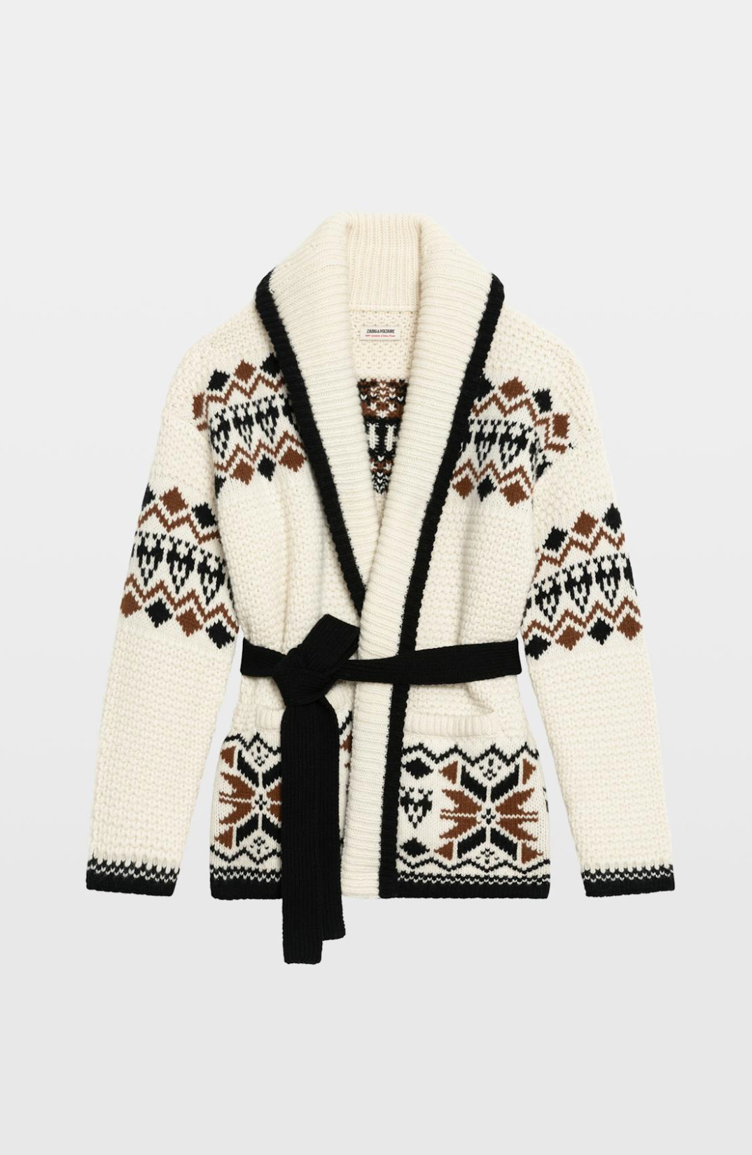 A cream-colored knit cardigan with black and brown Fair Isle patterns, featuring a black shawl collar, black trim, and a matching black tie belt, shown against a light gray background.